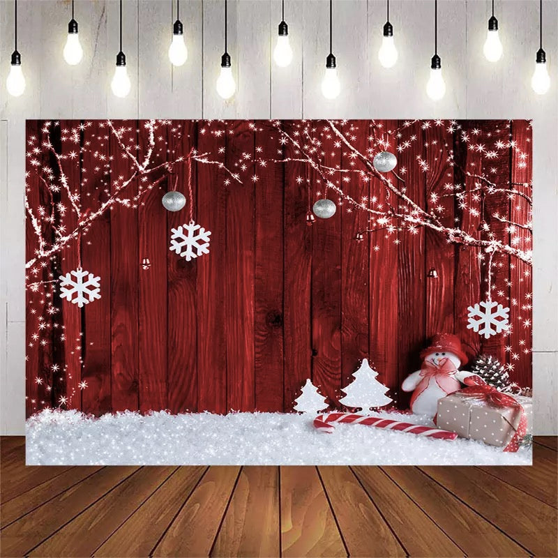 Thème de noël toile de fond flocon de neige cadeau bonhomme de neige branche d'arbre pin modèle rouge en bois photographie fond pour Studio Photo