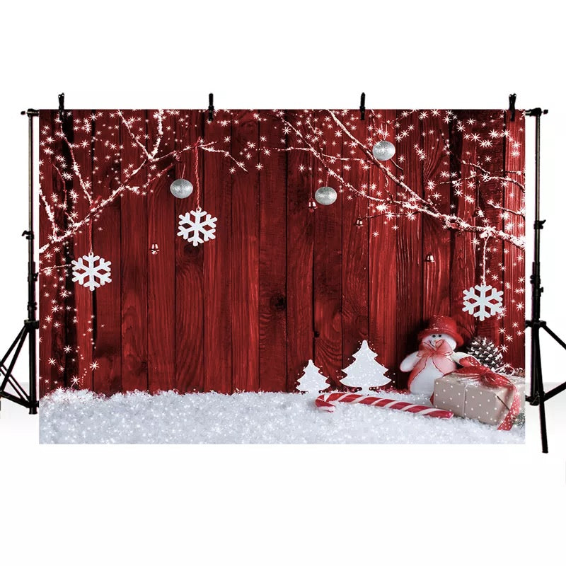 Thème de noël toile de fond flocon de neige cadeau bonhomme de neige branche d'arbre pin modèle rouge en bois photographie fond pour Studio Photo